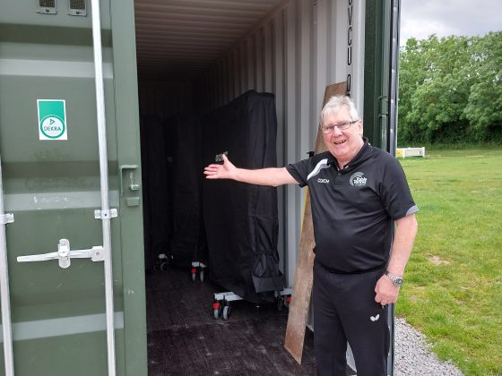 Dave Adamson standing in front of the new shipping container.
